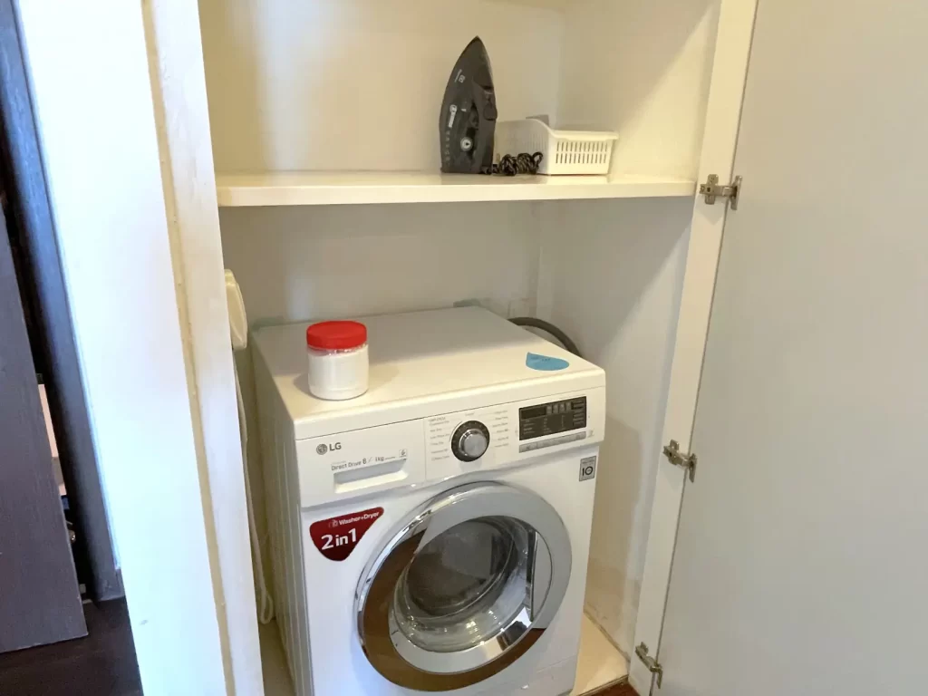 Washing machine and iron for usage in furnished service apartment