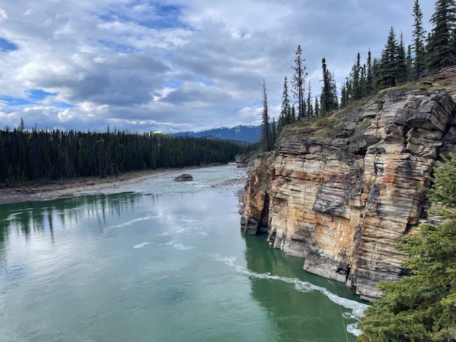 Mountain river flowing through natural landscape.