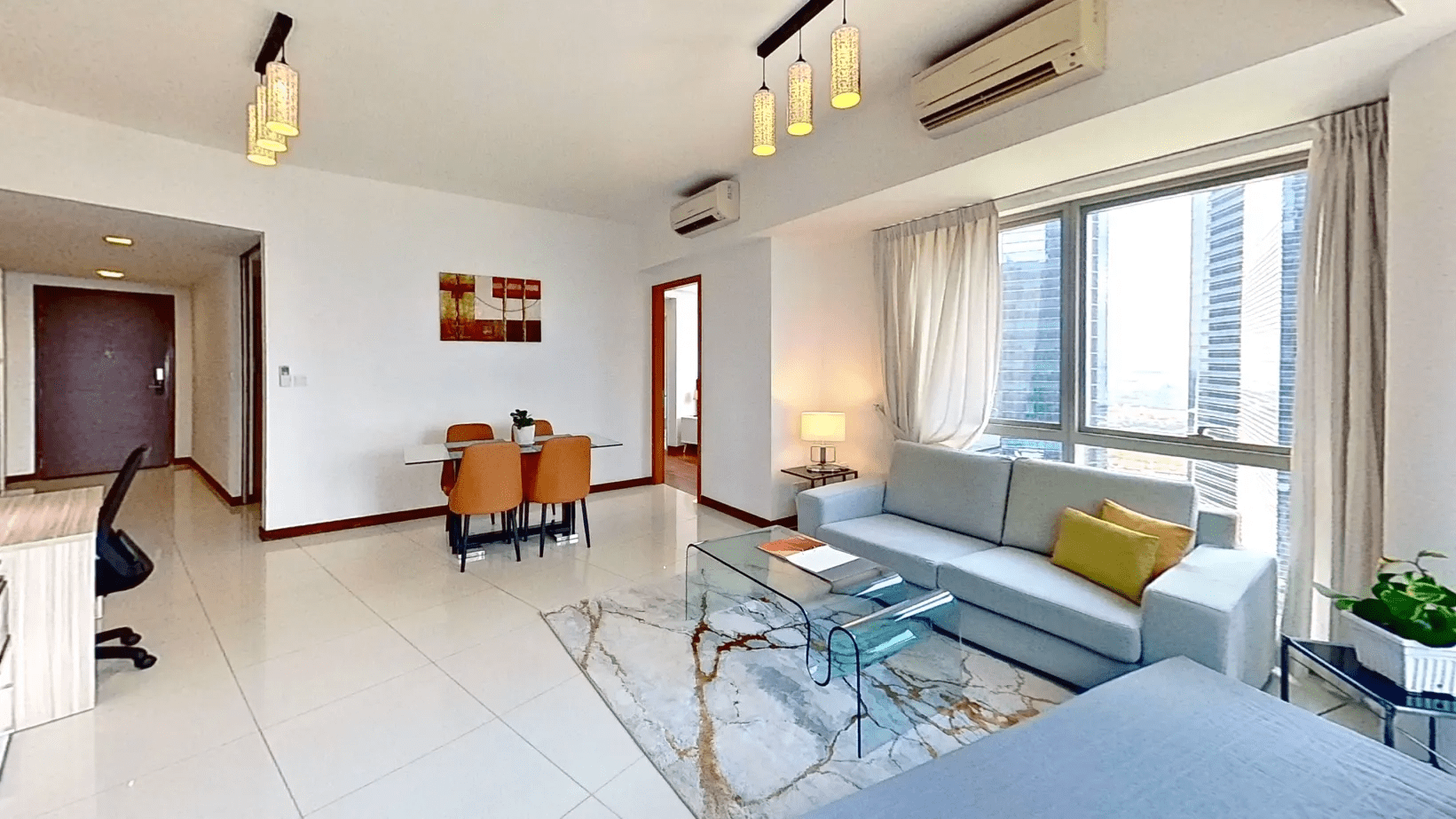 Modern living room with couch and chair.
