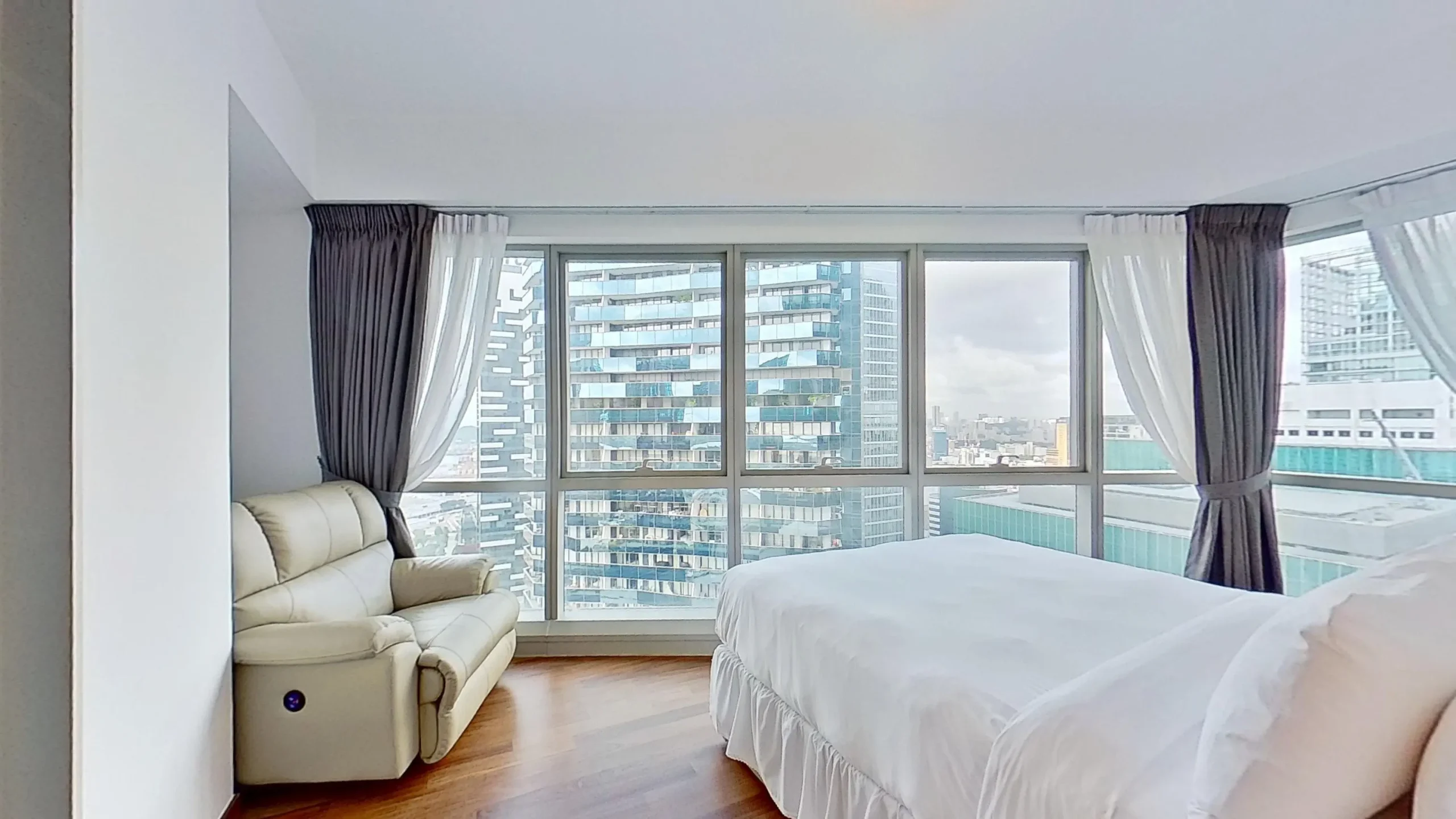 Modern apartment with bed and couch.