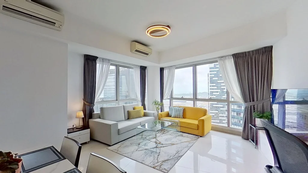 Modern living room inside a Raffles Place serviced apartment
