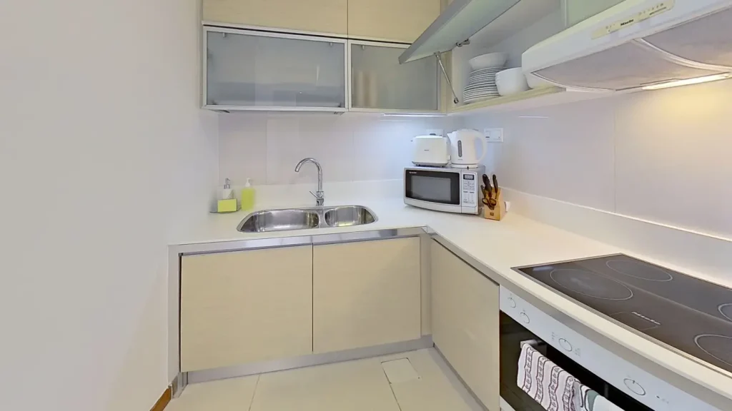 Two bedroom bayview suite kitchen area at Marina Bay