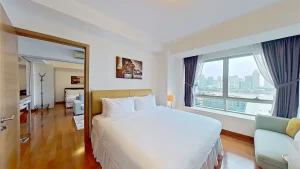 Two bedroom bayview suite master room with city view at Marina Bay
