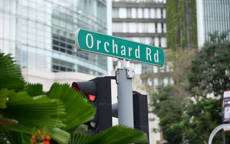 Orchard Road street sign indicating a prime Singapore stay location.