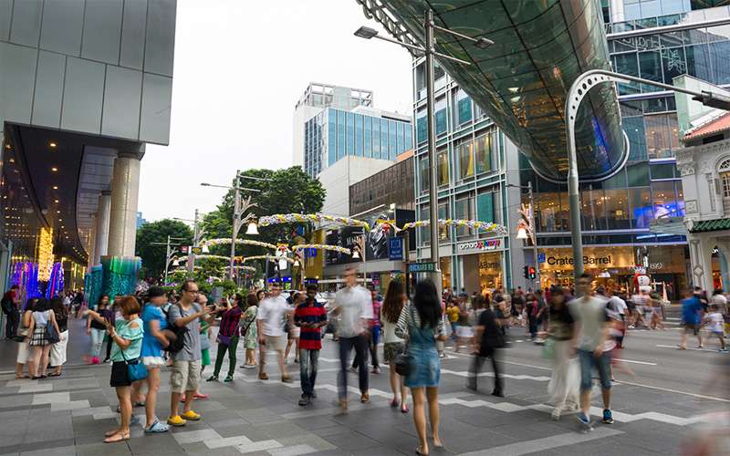 Bustling Orchard Road pedestrian shopping district.