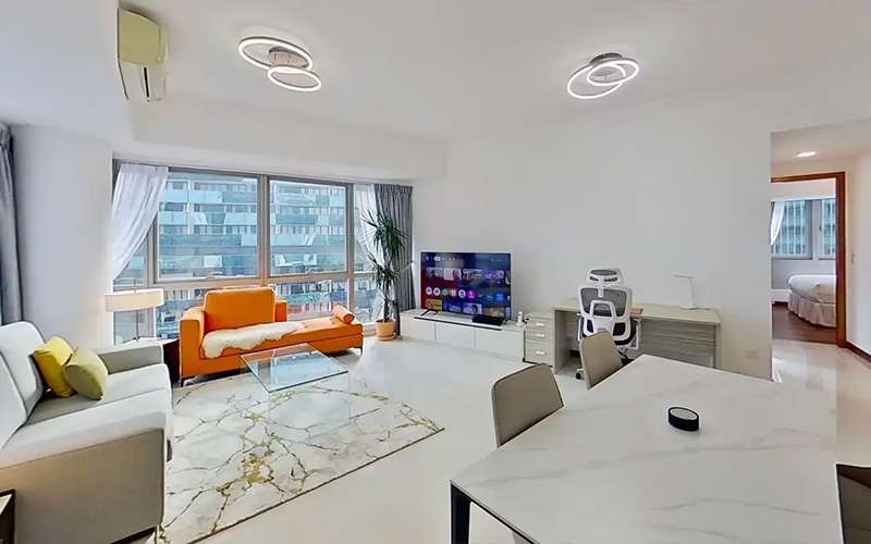 Spacious contemporary apartment with integrated living and dining.