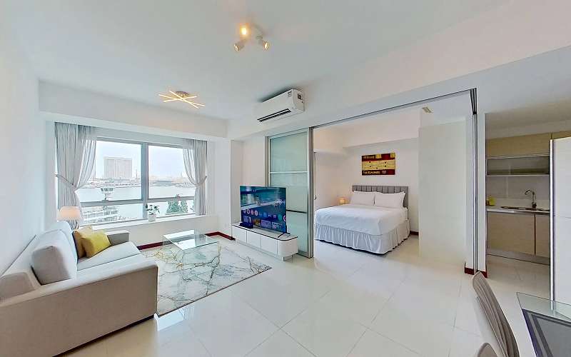 Dog-friendly serviced apartment in Singapore with scenic waterfront view.