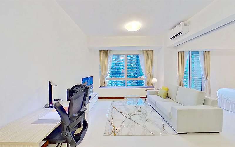 Modern dog-friendly serviced apartment living room in Singapore.